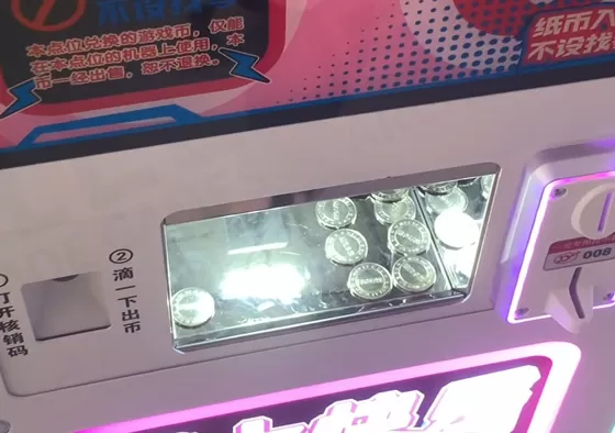 3. Coins or Tokens Dispense: Once confirmed, coins or tokens are quickly dropped from the internal hopper—reliable mechanics ensure smooth operation.