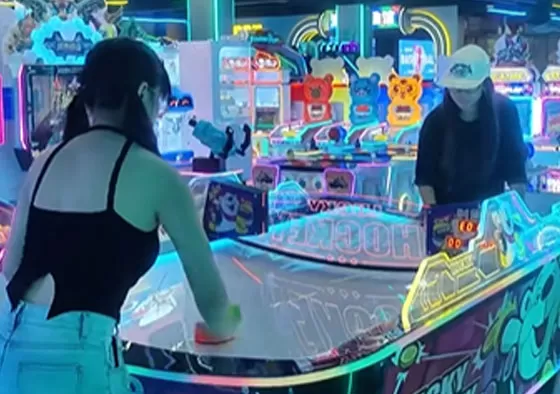 2. Control the Mallet, Attack & Defend: Rotate the handle to move your mallet and shoot the puck into the opponent's goal to score. Defend by sliding your mallet to block shots. Quick rebounds...