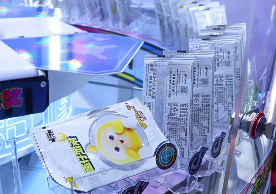 3. Press to Clip & Win: Press the button to release the clip. Successfully grab the prize to win.