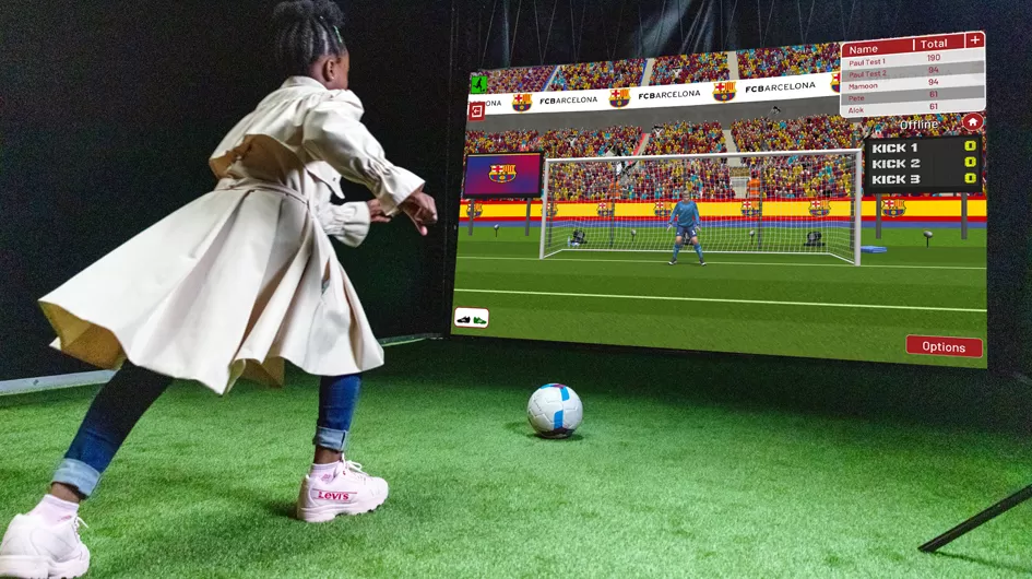player shooting on indoor football simulator game