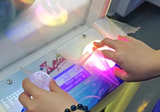 2. Use Joystick to Aim: Use the joystick to move the claw forward, backward, left, and right to find the optimal position for the claw to drop.