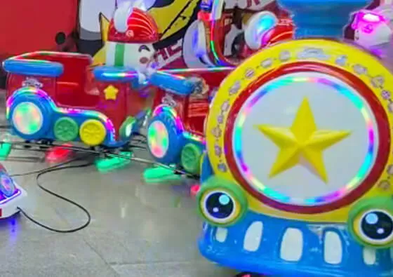 3. Enjoy the Scenic Journey: Hold on securely as the train begins its gentle circular journey around the track, accompanied by cheerful train sounds and music.