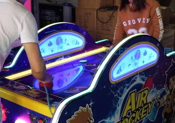 2. Control the Mallet, Attack & Defend: Rotate the handle to move your mallet and shoot the puck into the opponent’s goal to score. Defend by sliding your mallet to block shots. Quick rebounds an...