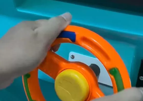 3. Enjoy Flying Entertainment: The ride begins its gentle rocking motion while the LCD screen plays engaging aviation animations and cheerful music, creating an immersive flying experience.