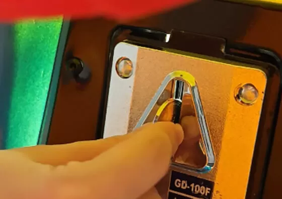 2. Mount Comfortably: Children sit securely on the bright yellow seat, holding onto the side grips for stability during the ride.