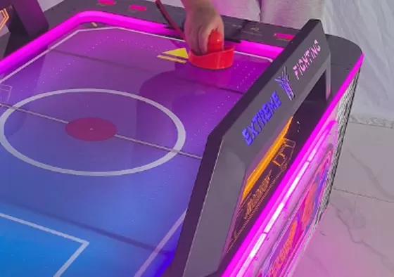 2. Control the Mallet, Attack & Defend: Rotate the handle to move your mallet and shoot the puck into the opponent’s goal to score. Defend by sliding your mallet to block shots. Quick rebounds an...