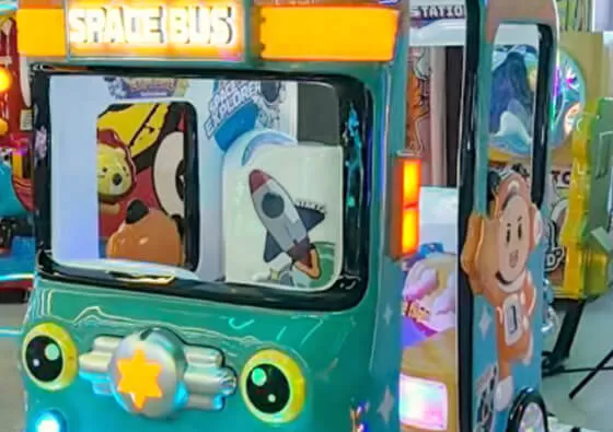 1. Insert Coins to Activate: Each rider inserts coins into their designated coin acceptor to power on their individual screen and prepare for the experience.