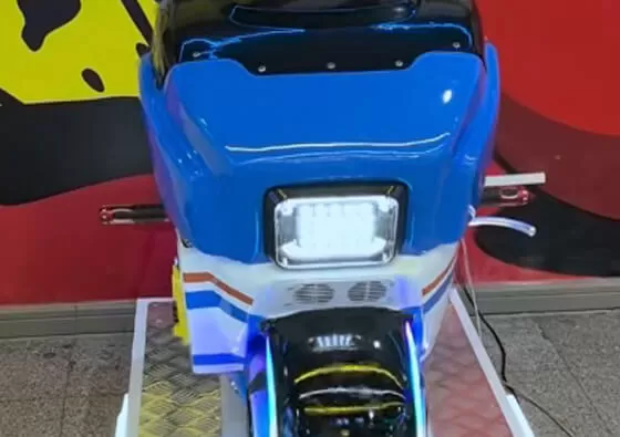 2. Choose Motorcycle and Scene: Use the selection buttons to browse and choose your preferred motorcycle model and scenic background for the adventure.