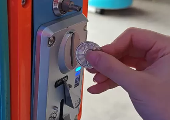 2. Mount Securely: Children sit comfortably on the snail-shaped seat, holding onto the secure grips for stability during the ride.