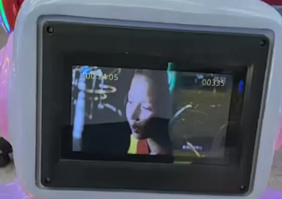 2. Board the Space Cup: Children climb into the spacious spinning cup and take their seats, holding onto the secure grips for stability.