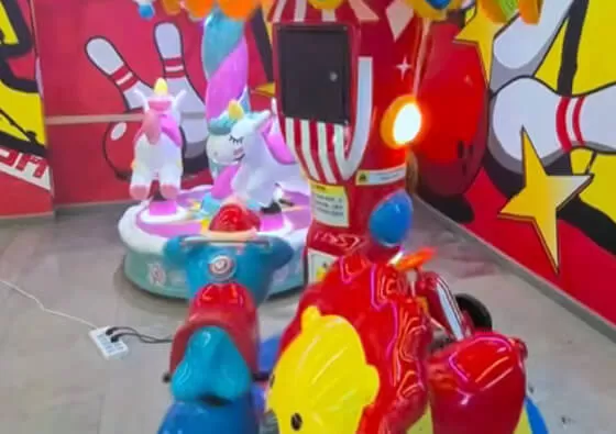 2. Choose Your Ride: Children select their favorite circus companion—the lion, the horse, or the convertible carriage—mounting securely with assistance as needed.