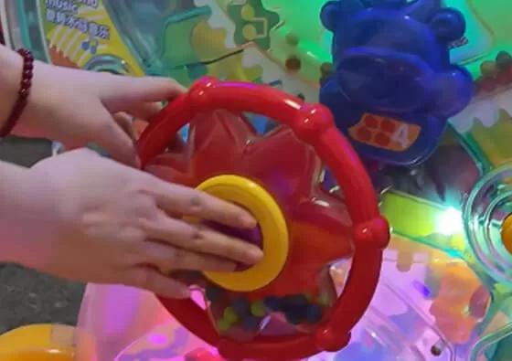 3. Enjoy the Gentle Ride: The ride begins its gentle rocking motion accompanied by cheerful music, creating a soothing and enjoyable experience for young riders.