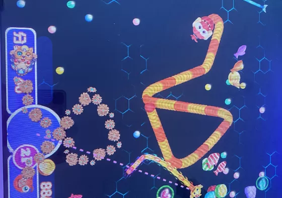 Step 2: Use the joystick to control your fish’s direction. Eat smaller fish to grow and advance your level.