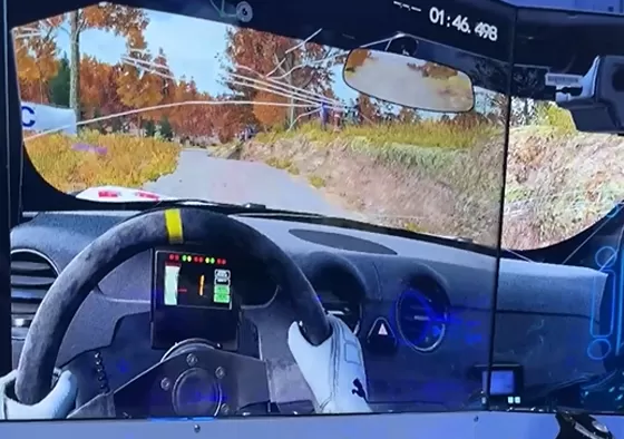 2. Don your seatbelt and adjust your seat position. Select your track and car from the game menu.