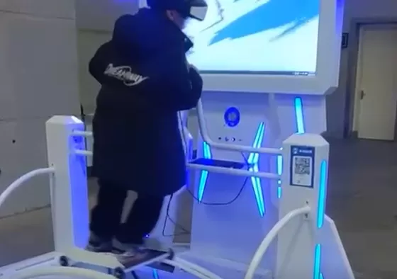 2. Players wear VR glasses and adjust seat straps.